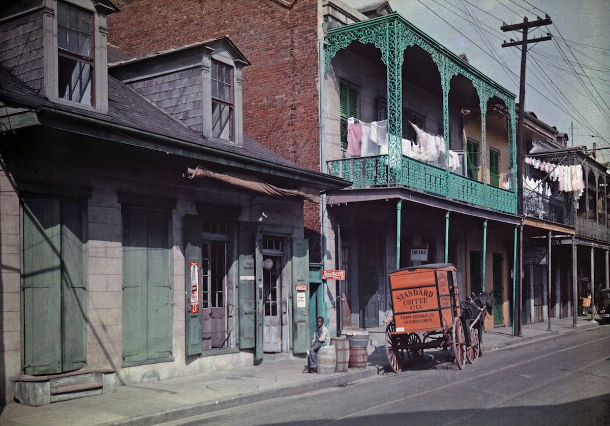 #35 A boy sits on a barrel outside a brewery in the French Quarter, New Orlean.