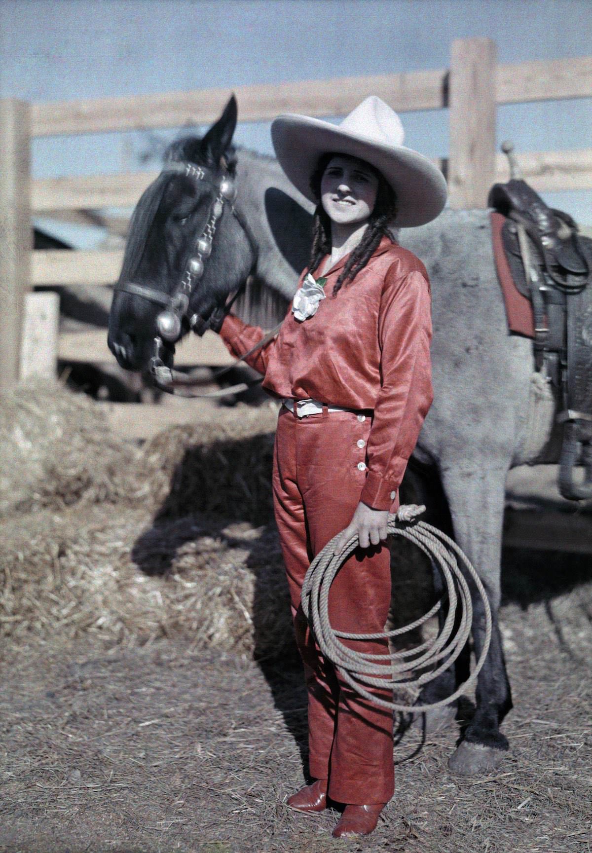 #6 A rider poses with her pony in a rodeo in Texas.