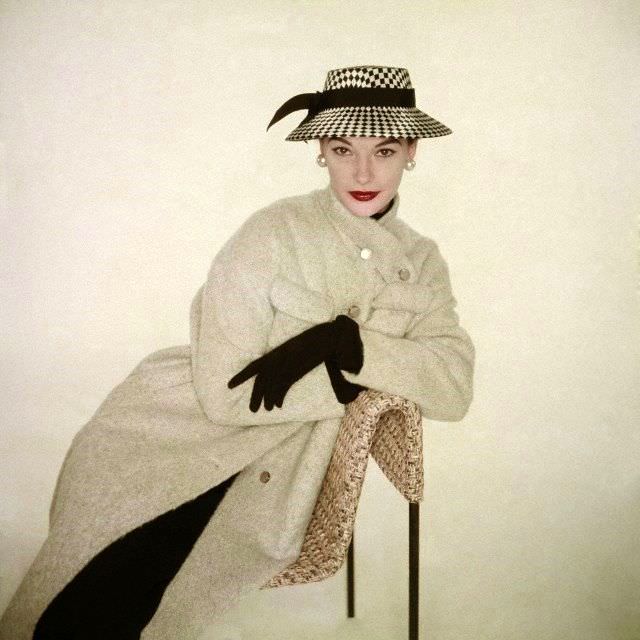 #24 Model wearing neutral colored coat by Kraeler together with hat from, January 1953