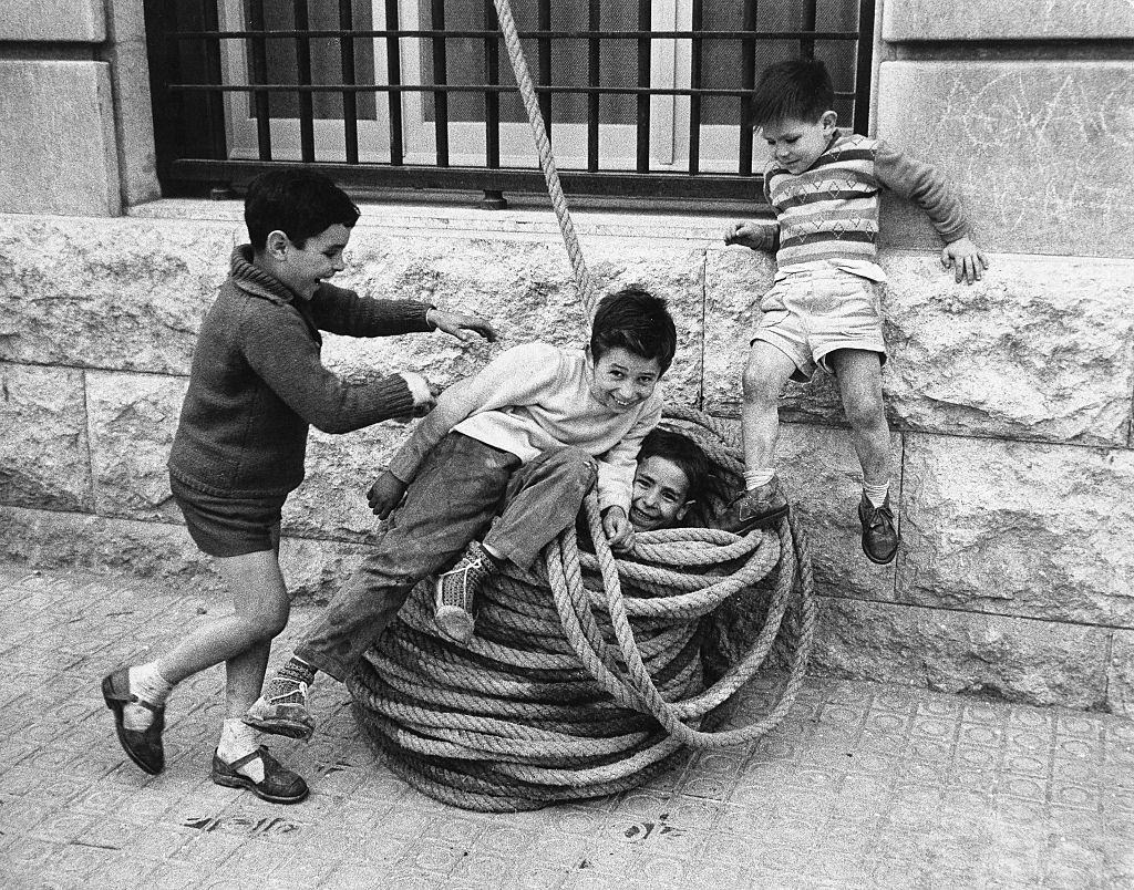 #11 Children playing with a rope in Barcelona, 1971.