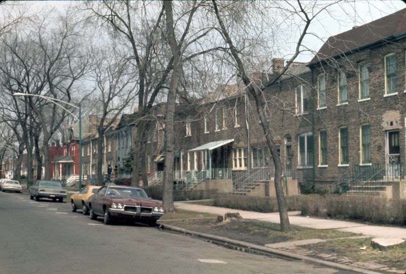 #27 South Champlain Avenue, a residential street in Pullman lined with brick duplex row houses, 1974