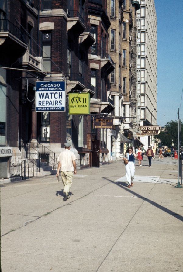#18 The sidewalk on the north side of East Chicago Avenue towards North Rush Street, 1976
