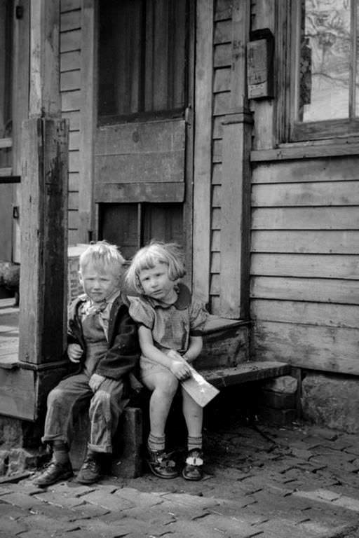#7 Children living in the river bottoms shacktown in Dubuque. 1940.