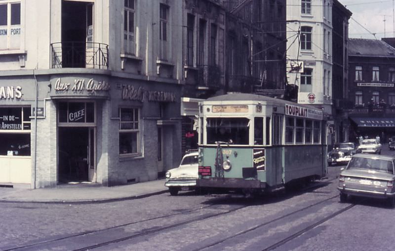 Motorcar 307 on route Nº 15 traversing the Rue de l’Eglise (Church Street) on his way to the South Station (Gare du Sud), Charleroi.
