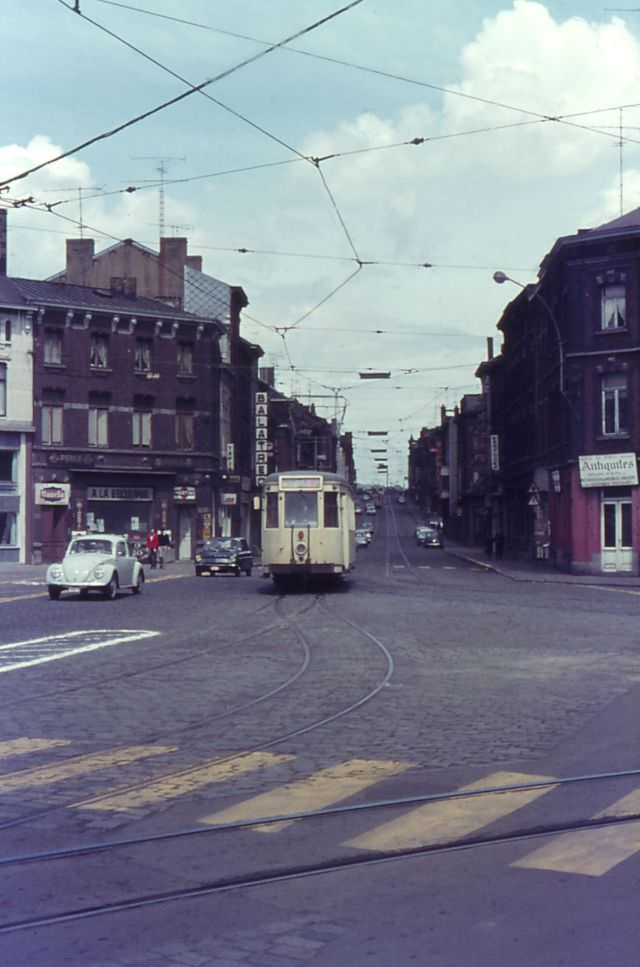 #23 Motorcar 10164 on route Nº 65 near the depot entrance at the Place de Tramways – The Tramway Square, Charleroi.