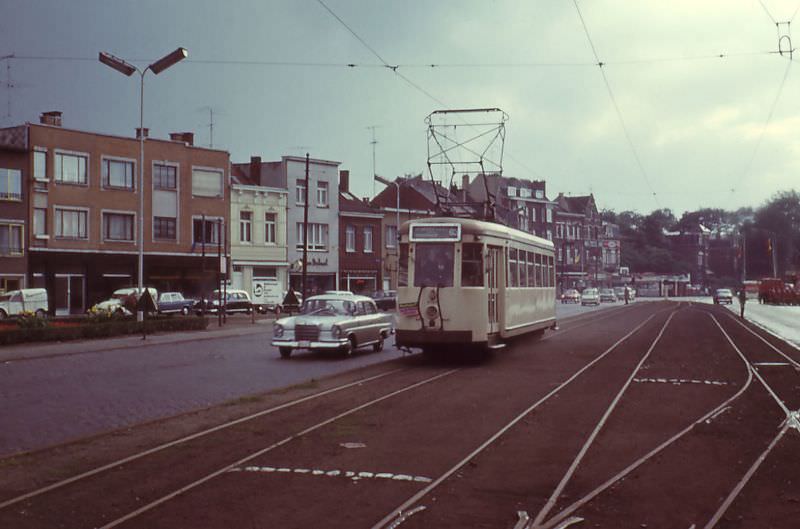 Motorcar 9647 on route Nº 63 (NMVB outbound) heading for Brasschaat passes the city tram terminal Merksem, Antwerp.