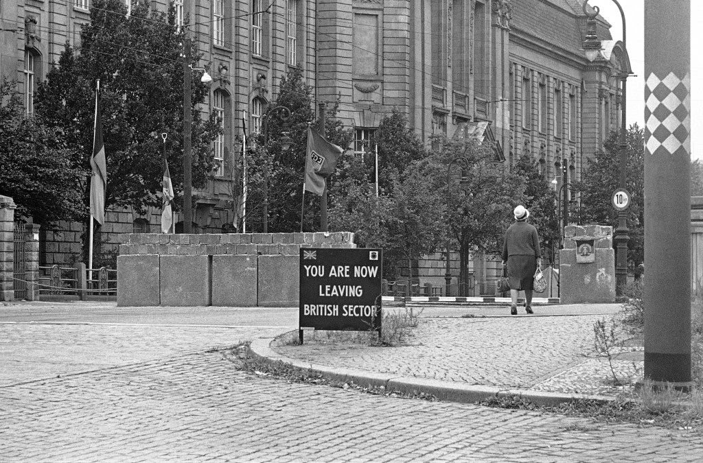 #28 The East Berlin authorities have put their emblems on small flags on the concrete wall at the Invalidenstrasse crossing point between the British and Russian sector border in Berlin on Sept. 9, 1961.
