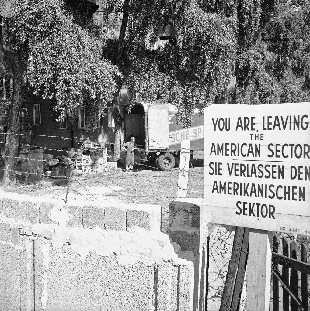 #37 Behind concrete wall with barbed wire east Berliners removing their furnitures in Berlin Sept. 20, 1961.