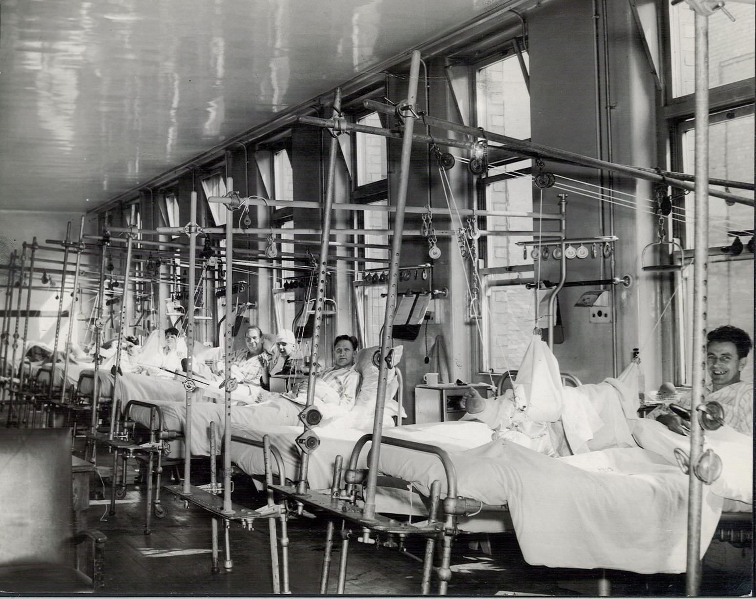 #30 A ward at Birmingham Accident Hospital, the men in beds are all motorcycle cases, in 1960.