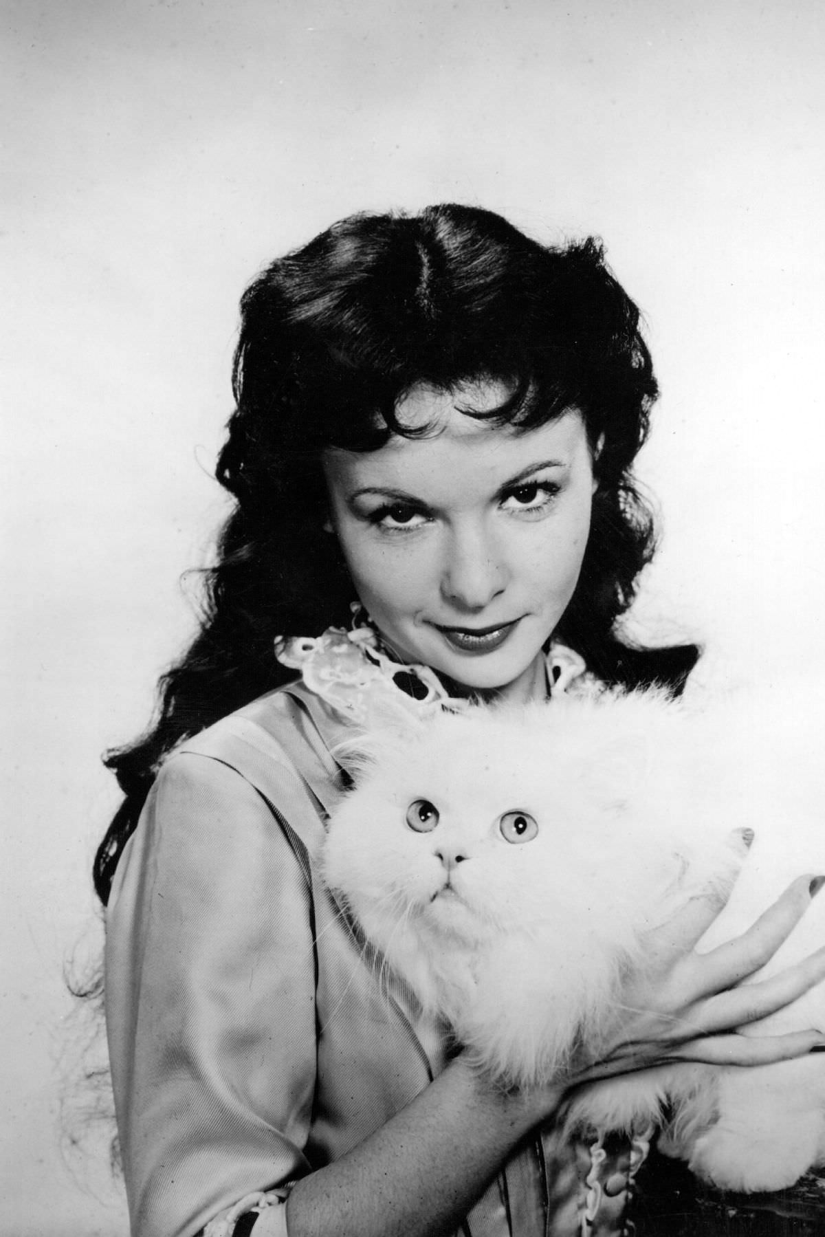 #12 French actress Françoise Arnoul with her Persian Cat, 1954