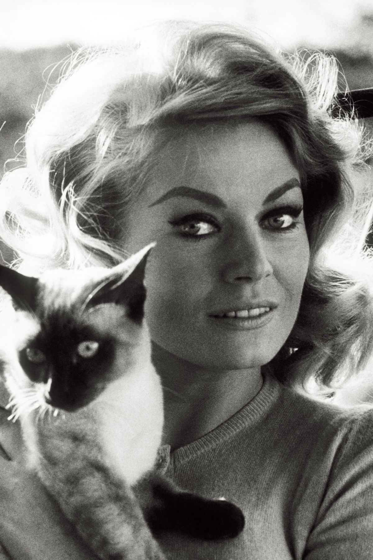 #25 Swedish actress-model Anita Ekberg looking a bit tentative, 1966.