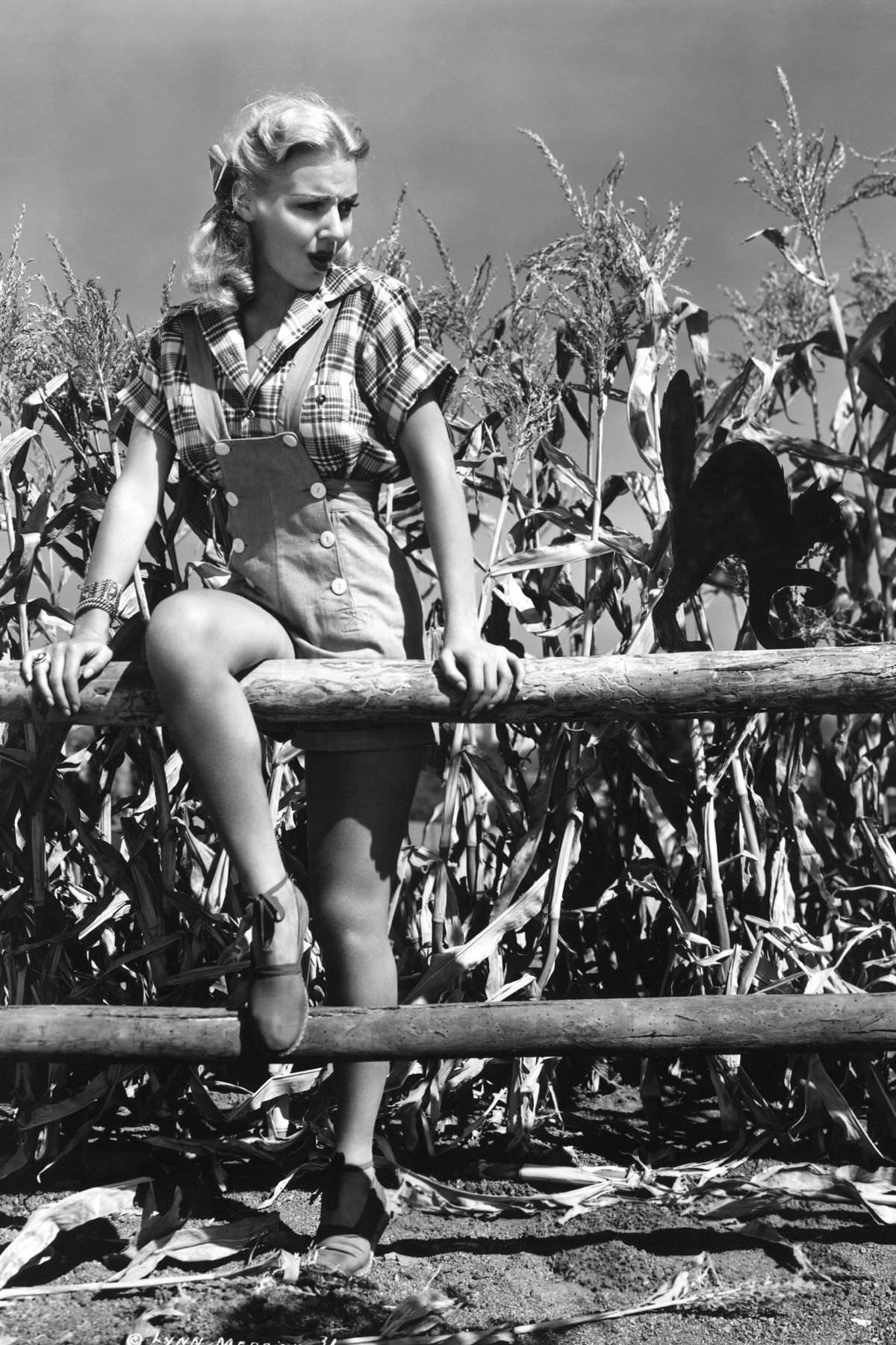 #6 Lynn Merrick and hers hang out in a cornfield in the early forties.