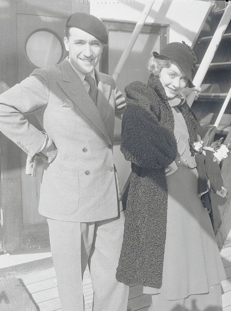 #32 Constance Bennett with her husband Marquis Henri de la Falaise, the couple going for a trip to Europe.