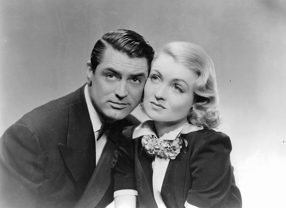 #17 Constance Bennett with Cary Grant in the film ‘Topper’, 1937