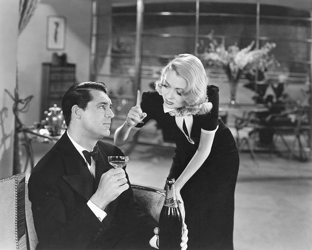 #40 Constance Bennett as Marion Kerby and Cary Grant as Georeg Kerby in the movie ‘Topper’, 1937.