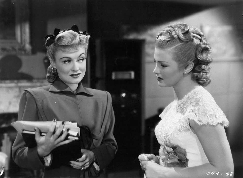 #41 Constance Bennett with Joan Caulfield in a scene from the film ‘The Unsuspected’, 1947.