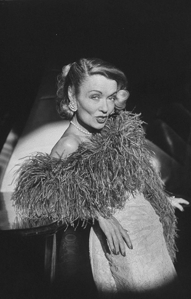 #63 Constance Bennett, making her debut as a night club singer at Hotel Pierre.