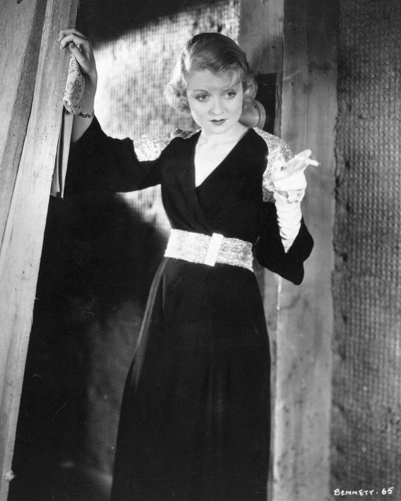 #10 Constance Bennett smoking a cigeratte during a movie scene, 1928.