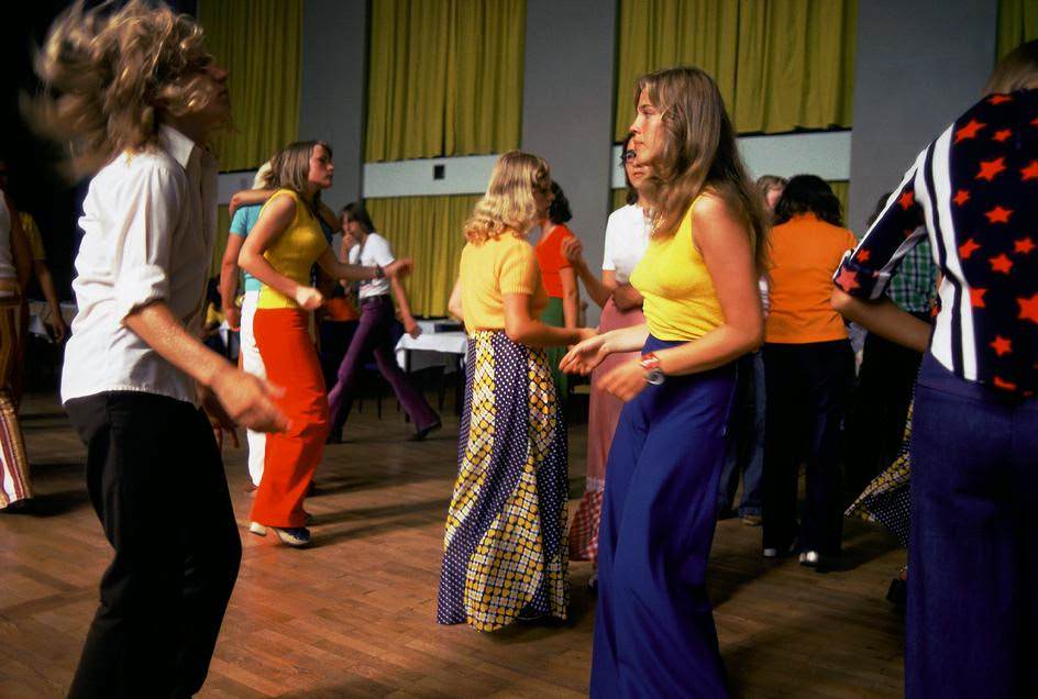#34 Young women dancing in a disco in Mecklenburg. East Germany, Mecklenburg, 1974.