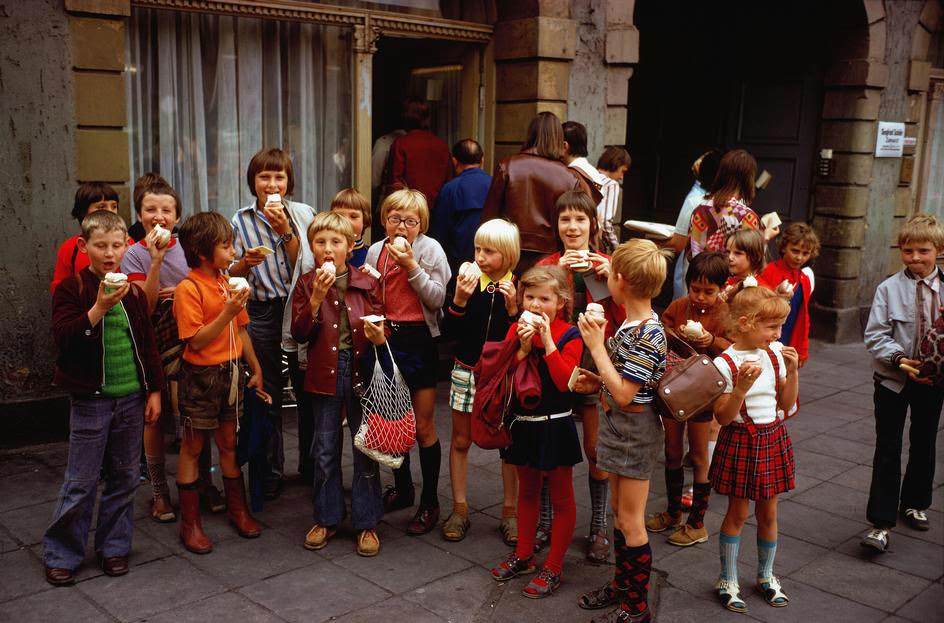 #4 An outing of school children has ice cream in the town center. East Berlin, 1974.