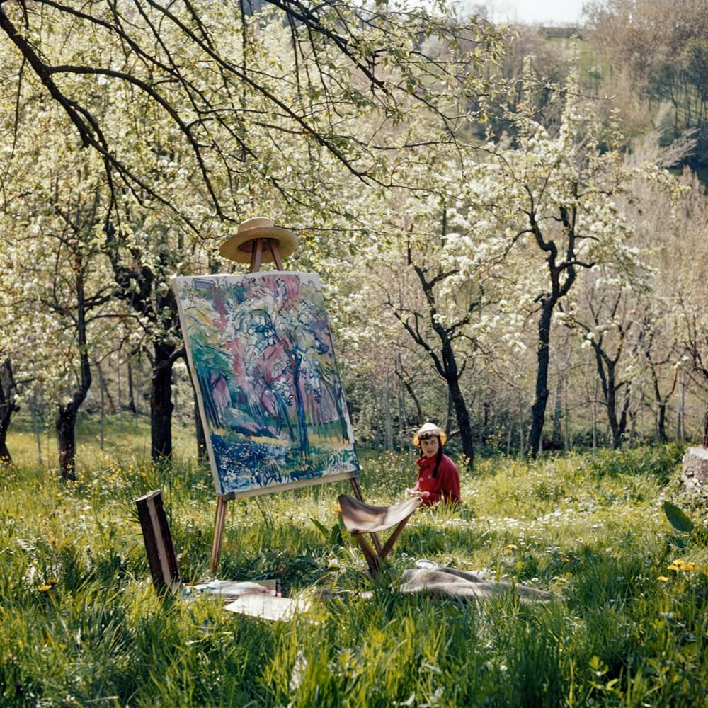 #14 A girl with a painting in the garden, opio, 1962.