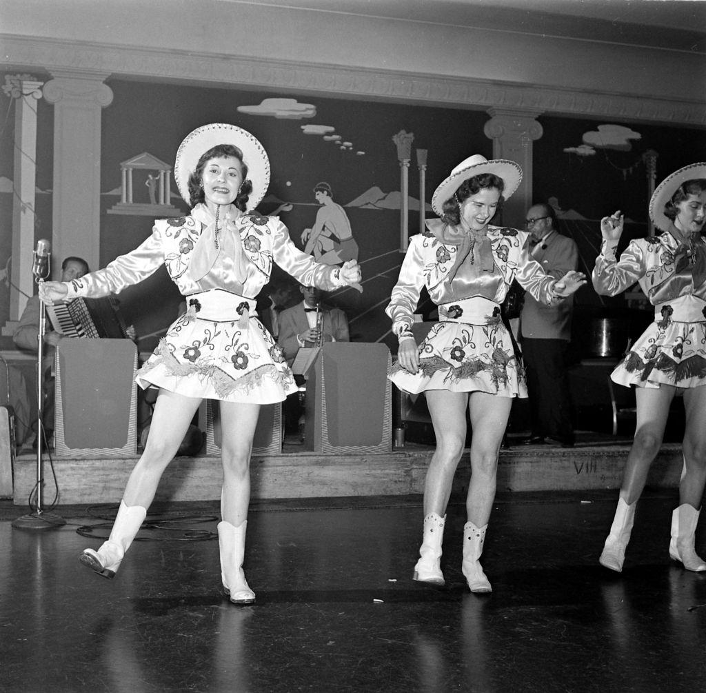 #20 Women in cowgirl costumes performing at a Houston charity ball in Houston, 1953.
