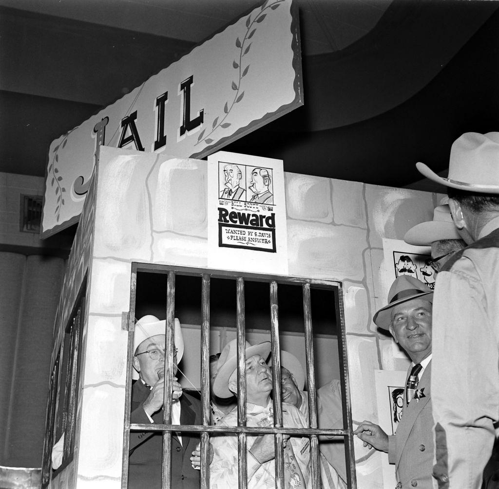 #23 Men standing inside mock-up jail in Houston, Texas, 1953.