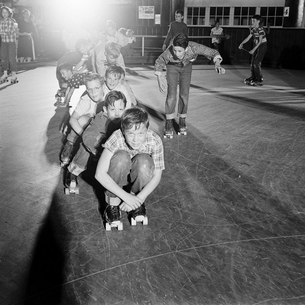 #24 Kids roller skating at a party, Houston, Texas, 1954.