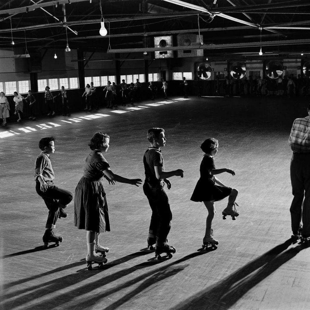 #25 Children roller skating at party, Houston, Texas, 1954.
