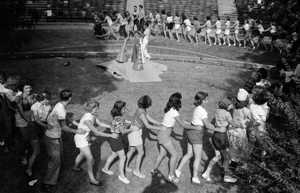 #30 Cheerleaders lining up at a cheerleaders school in Sam Houston State University, 1950.