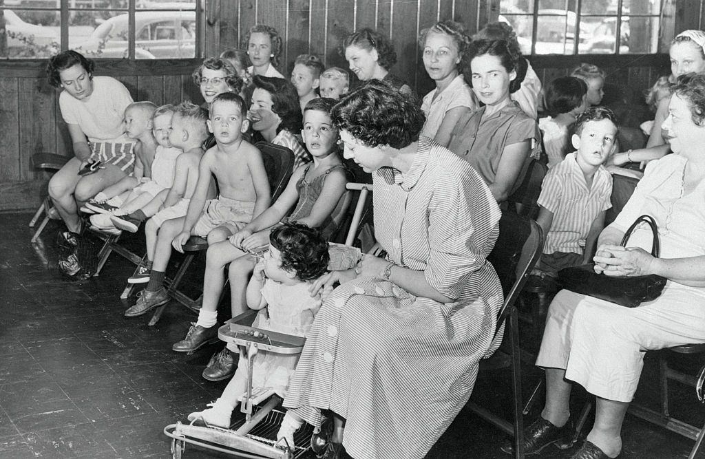 #34 Mothers and Relatives with Children Gathered for Polio Vaccine, 1952.
