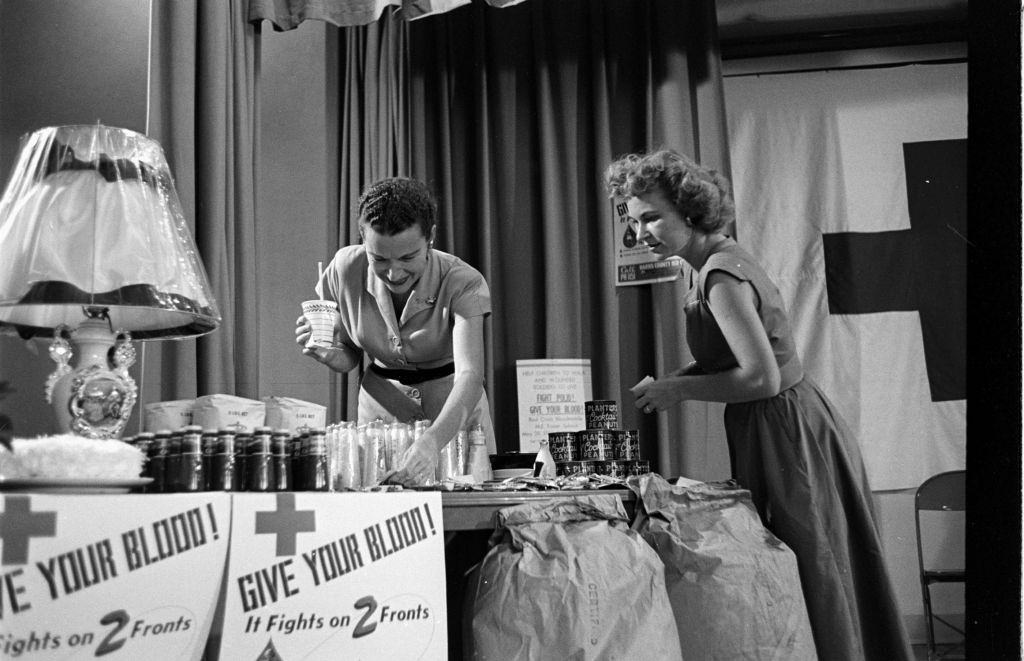 #4 Women standing during blood donation, Houston, Texas, 1953.