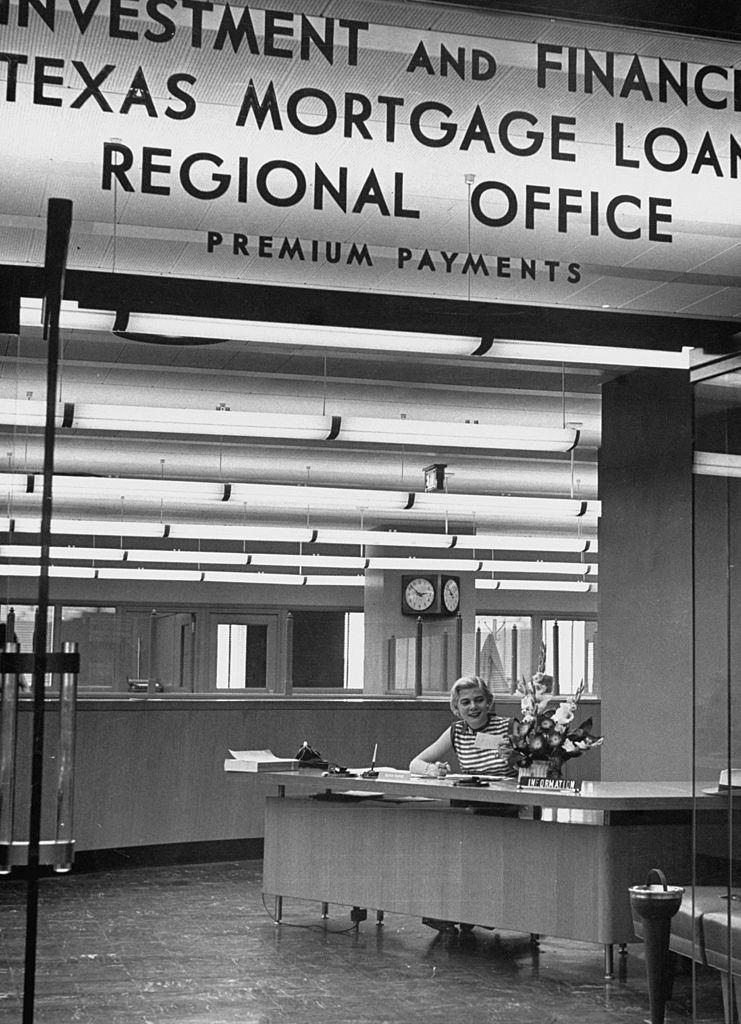 #49 Receptionist desk at Houston office of Prudential Life Insurance Co, 1952.