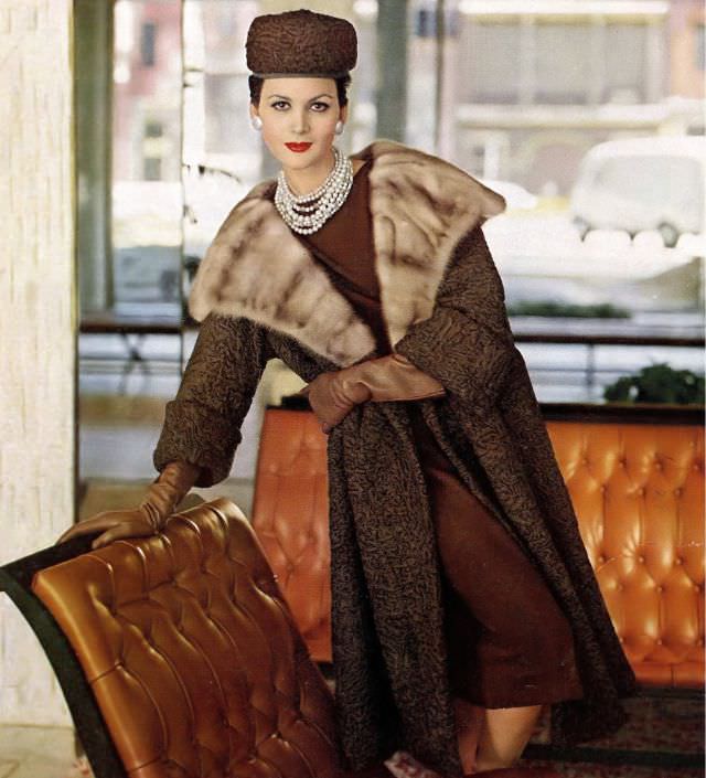 #38 Isabella Albonico in Southwest African Persian lamb coat with mink collar by Evans, hat by Amrose. Harper’s Bazaar, November 1960