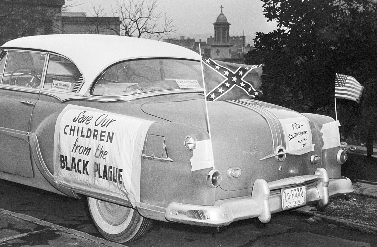 #26 US and Confederate flags fly from a car parked on Tennessee’s Capitol Hill in Nashville, where Gov. Frank Clement met with a delegation of pro-segregationists on Jan. 24, 1956.