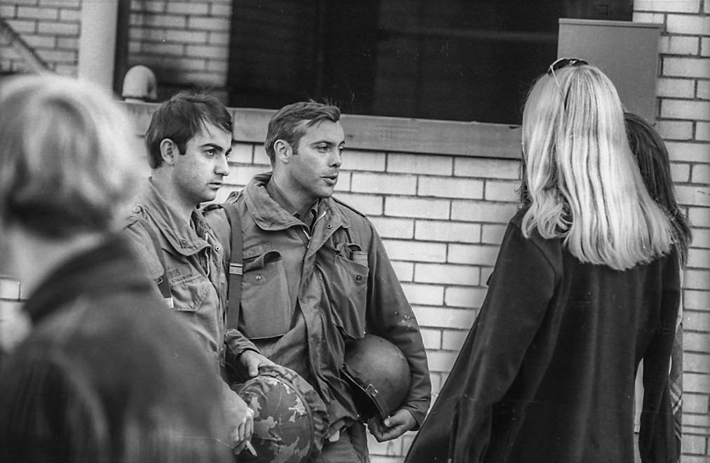 Ohio National Guardsmen as they talk with female Kent State University students on the university’s campus in the wake of student antiwar protests, Kent, Ohio, May 3, 1970.