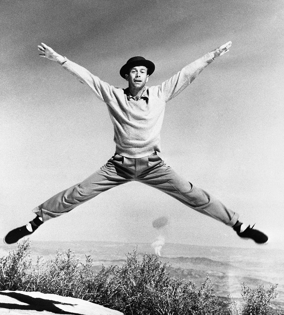 #25 Dancer Gene Nelson throws himself in all directions as he performs what he calls the ‘Atom Antic’ on a mountain top not far from Las Vegas, 1952.