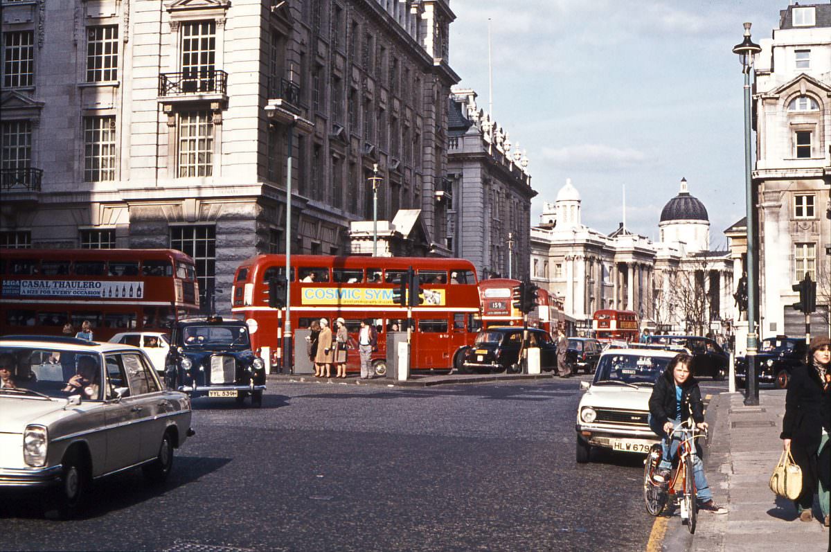#20 Routemasters turning from Haymarket into Pall Mall, April 1976
