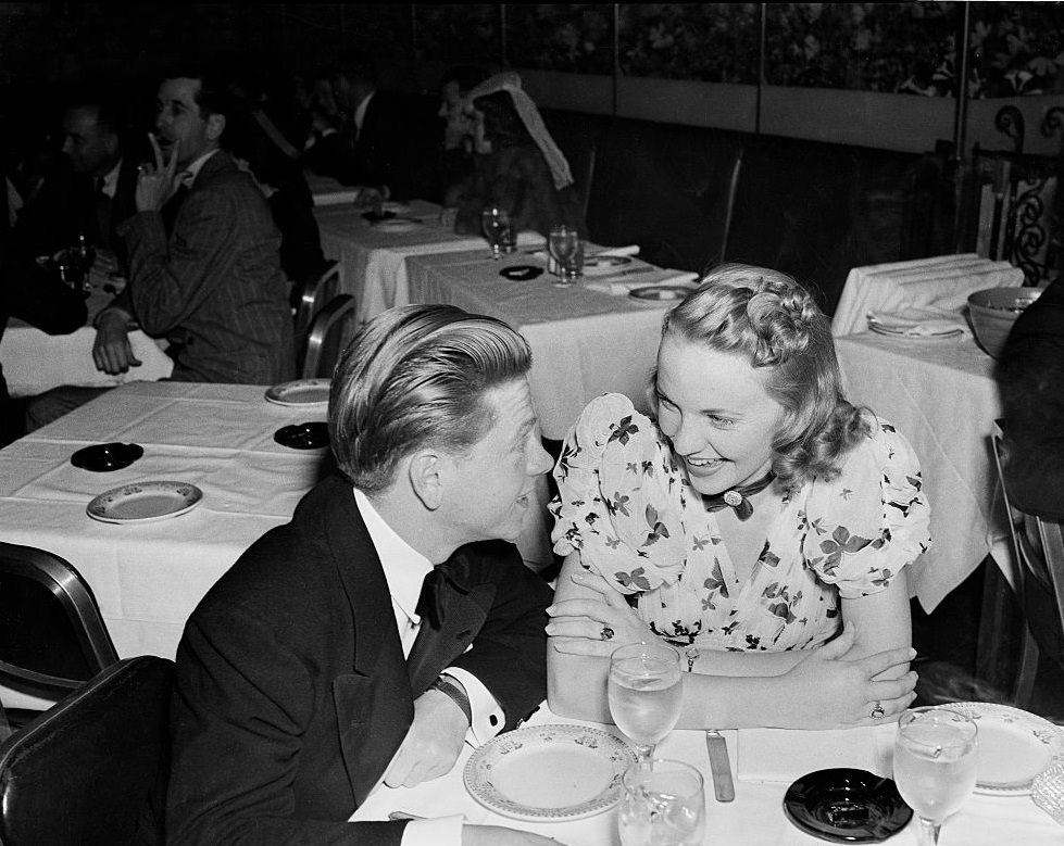 #35 Mickey Rooney has dinner with a friend in Los Angeles, 1937.