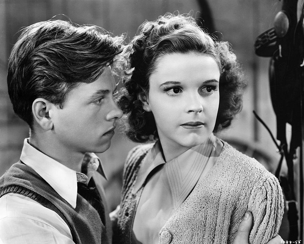 #59 Mickey Rooney with Judy Garland, 1939.