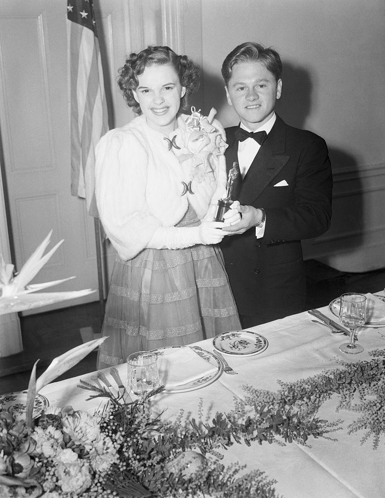 #65 Mickey Rooney wiht Judy Garland at the 12th Annual Awards Dinner on February 29th, 1939.
