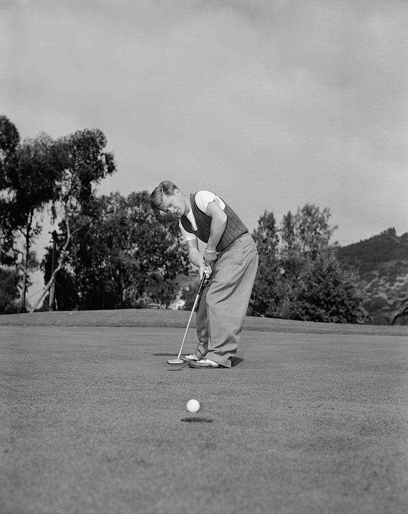 #66 Mickey Rooney playing Golf.