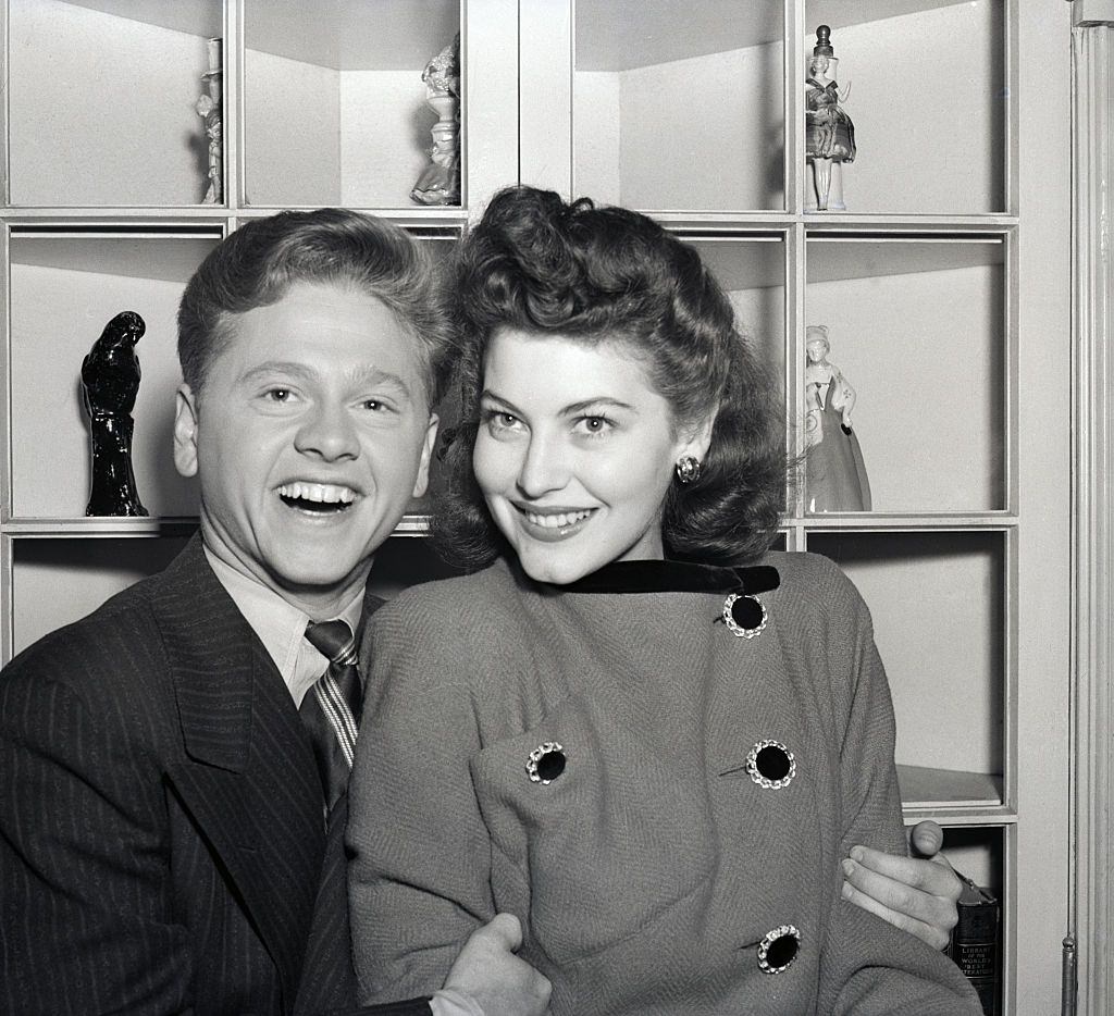 #67 Mickey Rooney with 18-year-old Ava Gardner, announcing their engagement.