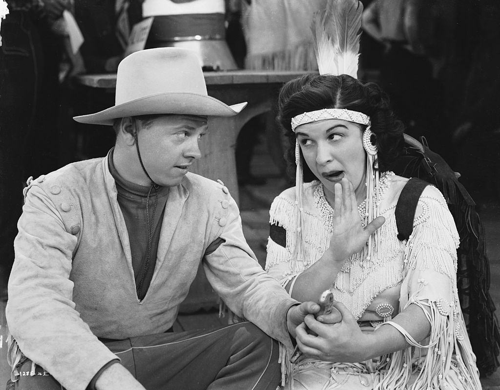#70 Mickey Rooney with Nancy Walker in a scene from Norman Taurog’s film ‘Girl Crazy’, 1943.