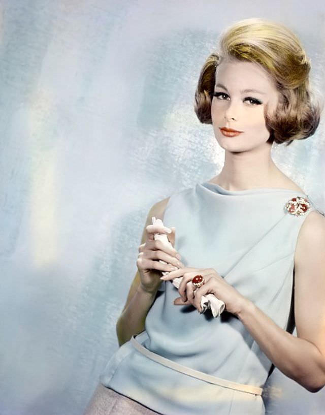 #11 Monique Chevalier in pale blue jersey blouse, 1961