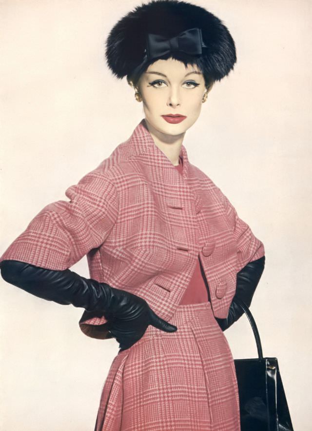#4 Monique Chevalier in raspberry Glen plaid wool suit, jacket lining and camisole of deep claret crêpe, Vogue. September 15, 1958