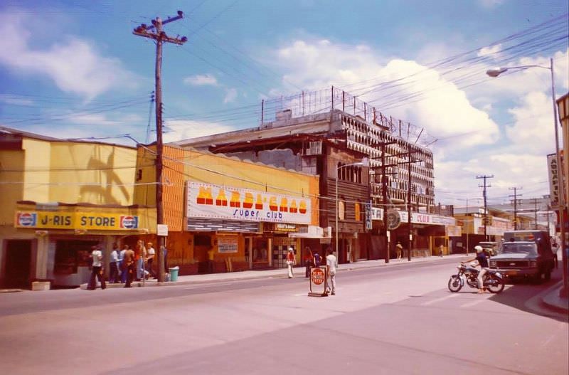 #14 Olongapo street scenes with the burned-out Pauline’s Club at right center (it burned in late 1968 or early 1969)