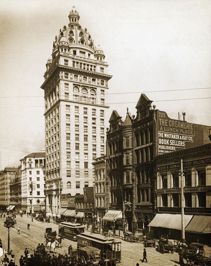 #55 Market Street in San Francisco, 1898. The largest here is the Call Building. Street shows trolley cars, horses and carriages.