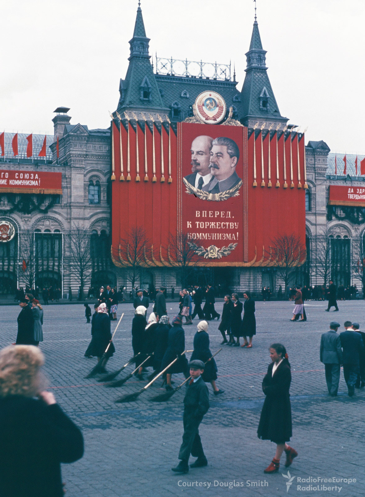 #18 Streetcleaners wielding tree-branch brooms on Red Square.