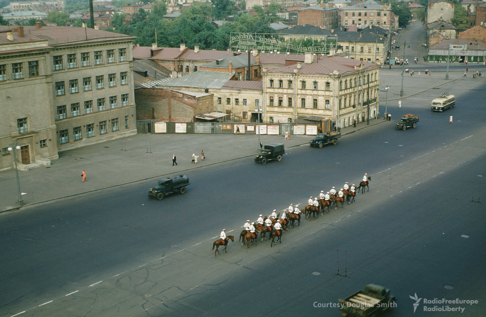 #24 A line of horses take over the center lane, unknown location.